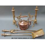 A 19th century brass companion set comprising shovel, tongs, and dogs,