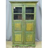 A painted / distressed glazed cabinet (W110 x D46 x H183cm)