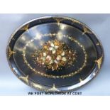 A large mother of pearl inlaid and gilt decorated papier mache tray,