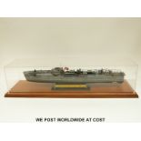 A kit built model boat 'German Fast Attack Craft 5-100 Class' on named plinth in acrylic case