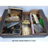 A large collection of Hornby, Trix and other 00 gauge buildings, accessories and scenery,