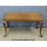 A carved teak coffee table,