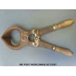 A vintage bull castrating tool