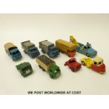 Nine Budgie Toys diecast model vehicles including rubbish wagons and towing truck.