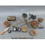 A collection of vintage fishing tackle including Ogden Smiths "Spinos" reel,