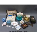 A mixed collection of items to include a musical tooled leather jewellery box, silver plated clock,