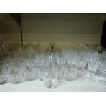 A quantity of cut glass ware to include large retro tapering vase, decanter etc.