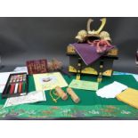 A miniature presentation Samurai helmet in lacquer box