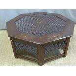 A suite of three Anglo Indian brass inlaid tables with fretwork detail and protective glass tops,