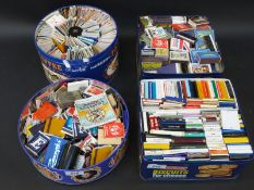 A large quantity of matchboxes and matchbox covers, including shipping, aircraft etc.