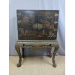 A 19th century Japanese laquer cabinet with fitted interior,