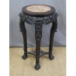 A 19th century Chinese carved padauk wood marble inset jardinere stand,