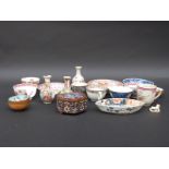 A collection of Chinese ceramics including cups, saucers, tea bowls,