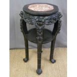 A late 19th/ early 20th century Chinese carved padauk wood marble inset jardinere stand,