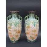 A pair of Japanese vases with raised and pierced decoration of flowers and gilt mark to bases,