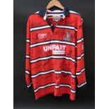 A Gloucester Rugby signed shirt, signatures include Andy Gomarsall, Adam Eusace, Phil Vickery,