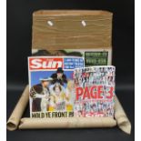 Over 40 The Sun Page 3 calendars together with two related books.