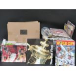 A large collection of football related books,