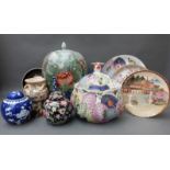 A collection of Chinese and Japanese ceramics including ginger jars, plates,