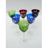 A set of six overlaid and cut glass coloured hock glasses