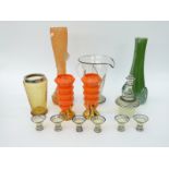 A collection of retro coloured glassware including a liqueur set