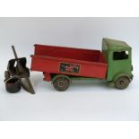 A Tri-ang pressed steel tipper lorry with green cab and red body and wheels,
