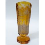 A 19th century continental flash overlaid engraved glass beaker of octagonal form decorated with