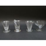 Four 19thC glass custard cups, all with applied handles and cut decoration, largest 8.