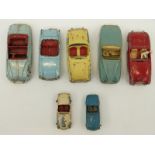 Seven Dinky, Matchbox and Spot-On diecast model cars.
