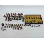 Over 50 Britains and similar lead soldiers and figures including Royal figures, Carman etc.