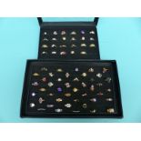 Over 60 rings set with various gemstones