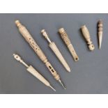 A collection of ivory and bone stanhopes,
