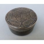 A 19thC carved horn snuff box with white metal collar,