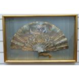 A 19thC hand painted carved mother of pearl and gilt fan in glazed case,