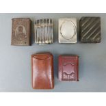 Six various vesta cases including an Edward VII example in the form of a book, plated examples,