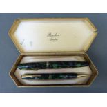 A boxed Burnham fountain pen and propelling pencil set,