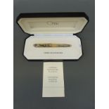 Omas Ogiva fountain pen with 18k white gold medium nib and clear body showing workings,