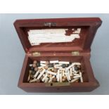 A 19thC mahogany ballot box with pens and clay pipes for voting,