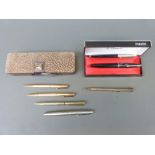 Eight fountain pens, propelling pencils etc including a pair of rolled gold Yard-o-led,