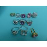 Eleven rings set with large cubic zirconia including silver