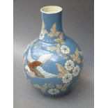 A CH Brannam pottery vase decorated with birds and flowers,