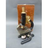 W R Prior & Co of London brass microscope in wooden box complete with lenses,