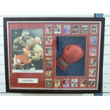 A Frank Bruno signed boxing glove in frame,