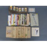 A quantity of cigarette card albums, mainly 1930s, including tennis, football, motor cars,