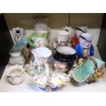 A collection of ceramics including Coalbrookdale style basket, Sarreguemines character jug,