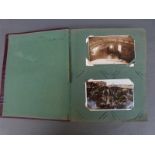 A postcard album containing approximately 200 early-mid 20thC examples,