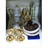 Two relief plaques, a decorative coffee set, two figural vases,