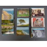 A box and two albums of postcards, early and modern, includes greetings cards,