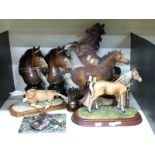 A quantity of horse figures