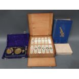 A cased set of microscope slides comprising twelve trays of largely botanical,